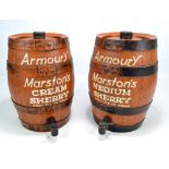 A pair of 'Armoury Marston's' cream sherry barrels, height 34cm.
