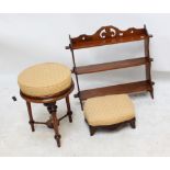 A Victorian mahogany circular stool, a footstool with matching upholstery, and a wall unit,