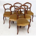 A set of six Victorian mahogany crown top balloon back chairs with cabriole front legs.