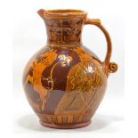 JOHN POLLEX (born 1941); a large slipware harvest jug decorated with a king and queen,