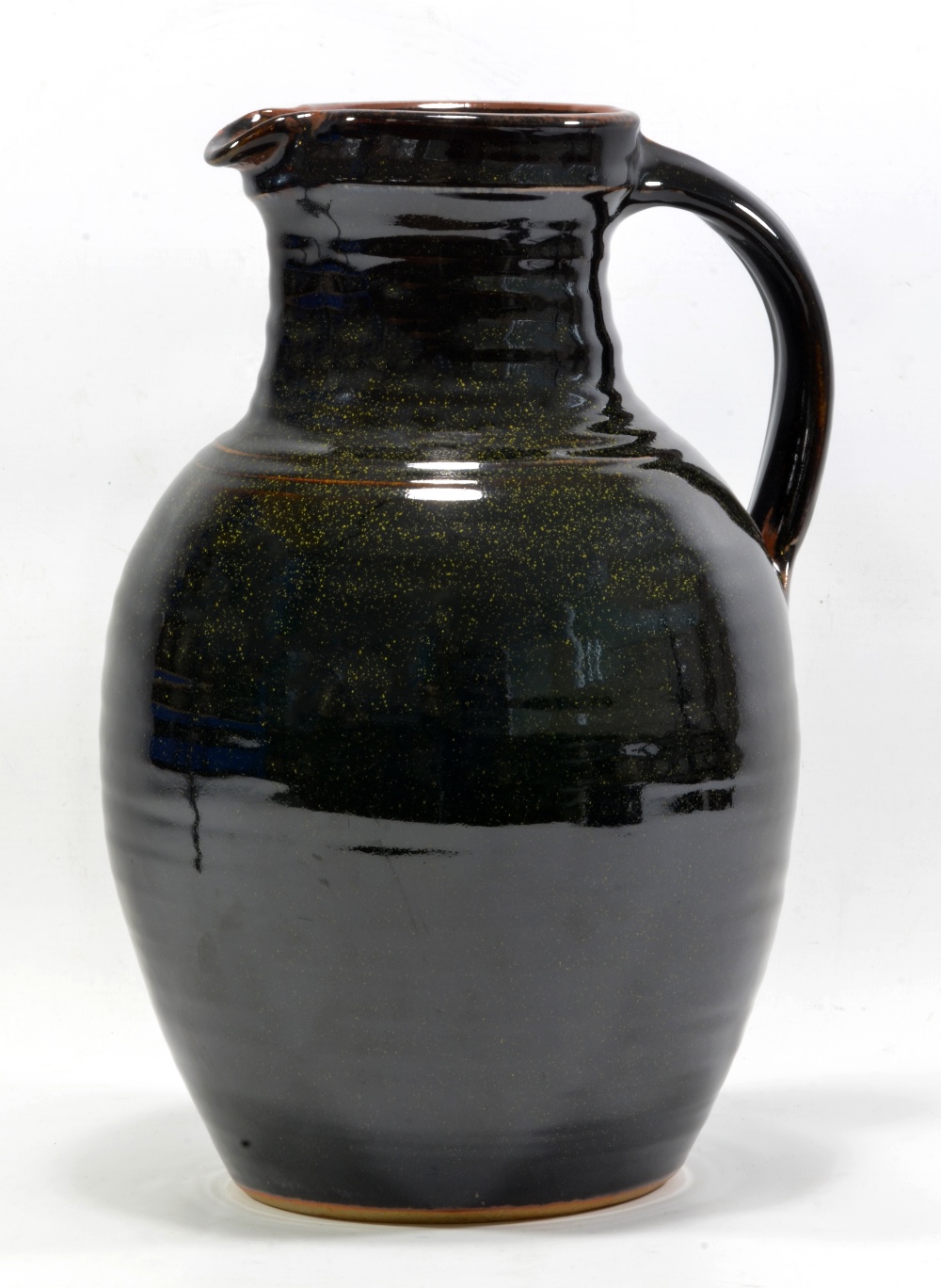 RAY FINCH (1914-2012) for Winchcombe Pottery; a large stoneware jug covered in tenmoku glaze,