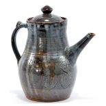 BAWA USHAFA for Abuja Pottery; a stoneware coffee pot covered in blue/grey glaze, impressed marks,