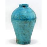 ABDO NAGI (1941-2001); a raku vase covered in mottled turquoise glaze, painted mark, height 22.