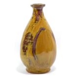 MIKE DODD (born 1943); a stoneware bottle, clay slip under Shap granite glaze,