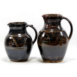 RAY FINCH (1914-2012) for Winchcombe Pottery; two stoneware jugs with meander patterns,