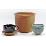 RAY FINCH (1914-2012) for Winchcombe Pottery; a stoneware gravy boat and saucer and a tea bowl,
