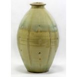 MIKE DODD (born 1943); a large stoneware bottle covered in pale green and blue/green glaze,