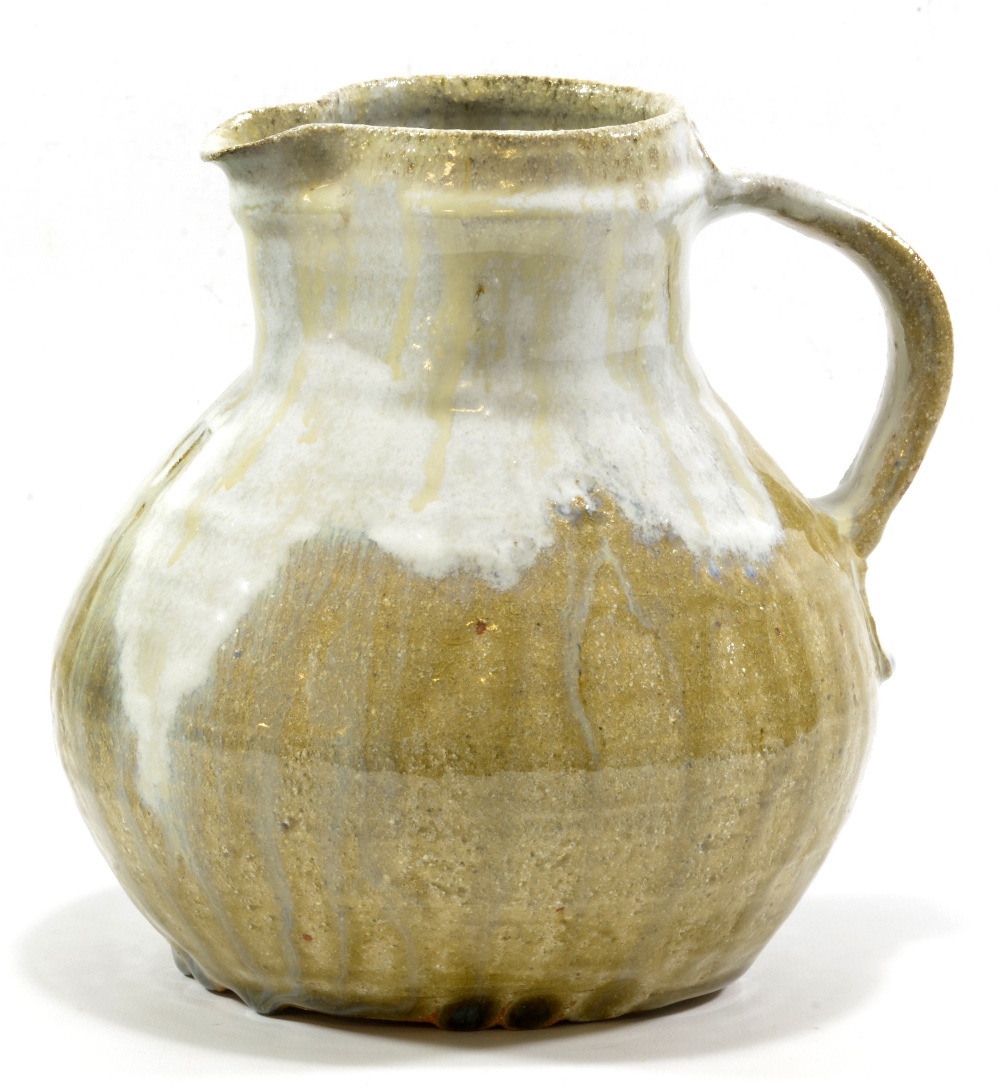 WILLIAM MARSHALL (1923-2007); a squat stoneware jug covered in green ash glaze with Chun pours,