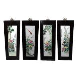 A set of four Chinese Republic period porcelain plaques painted in the Famille Rose palette with
