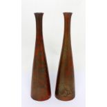 A pair of Japanese patinated metal vases of tapering bottle form, signed to base, height 24cm.