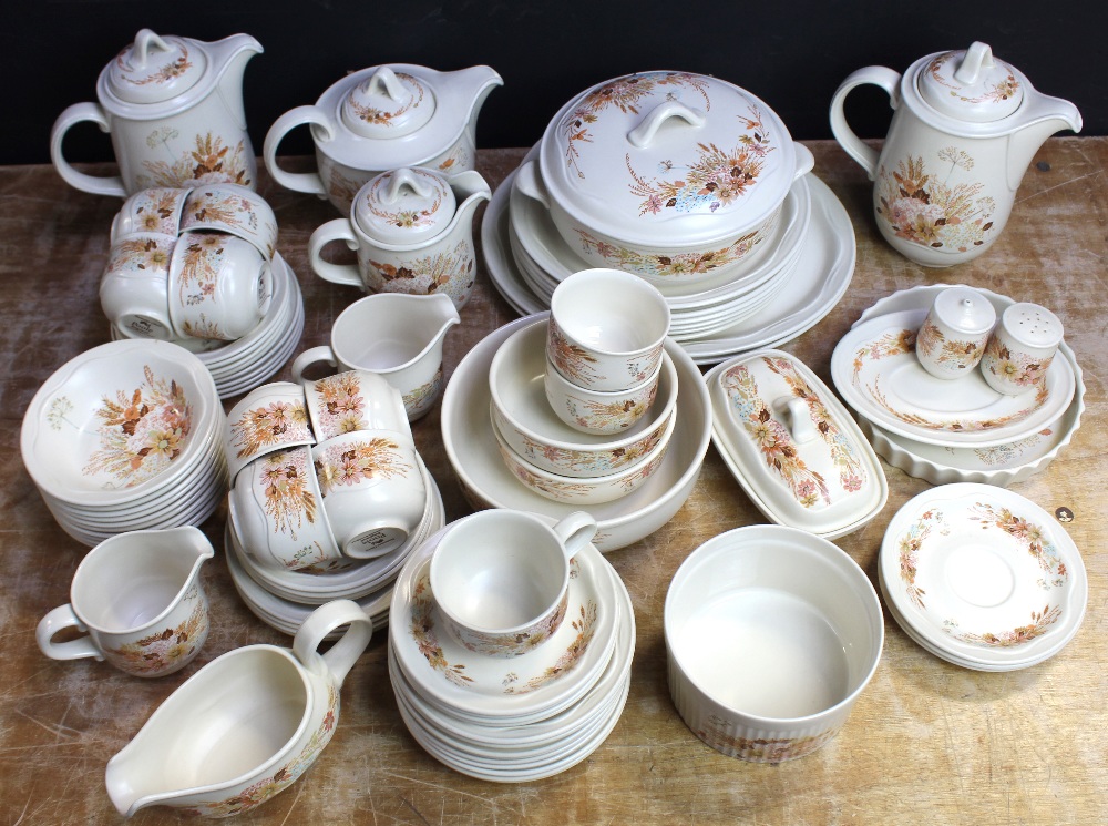 A large quantity of Poole 'Summer Glory' dinner and teaware to include teapot, two coffee pots,