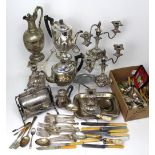 A quantity of plated ware to include a Walker & Hall part tea service, a claret jug, muffin warmer,