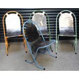 Four retro-style metal kitchen chairs, distressed and beaten metal seat on painted curved supports,