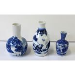 A small Oriental hand-painted blue and white vase with four character marks to base, height 11cm,