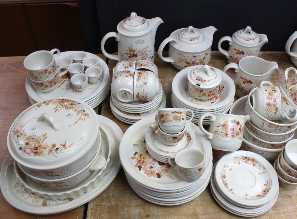 A large quantity of Poole 'Summer Glory' dinner and teaware to include teapots, coffee pots,