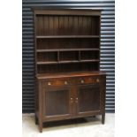 An early 20th century oak country-style Welsh dresser,