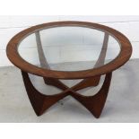 A retro G-Plan style circular coffee table with glass top, diameter 85cm.