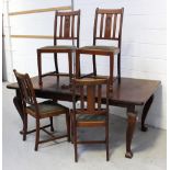 A late 19th century mahogany wind-out table with two extra leaves on Oriental-inspired cabriole