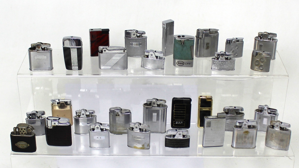Thirty vintage Ronson cigarette lighters to include silvered examples, engine-turned examples,