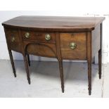 A 19th century mahogany bow-front sideboard, two central frieze drawers,