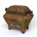 A 19th century Oriental terracotta censer, lift-off top revealing turquoise glazed interior,