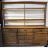 A late Victorian open-back pine dresser,