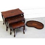 A mahogany reproduction set of three rectangular tables on cabriole supports and a vintage mahogany