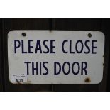 A wall plaque, inscribed 'Please close this door', width approx 9".