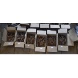 A large quantity of flat-head screws, each approx. 5 1/2".