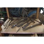 A quantity of blacksmith's tools, ratchet drill, hooks etc. (8).