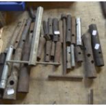 A collection of ring spanners, length of longest approx. 12 1/2" and a cutting tool.