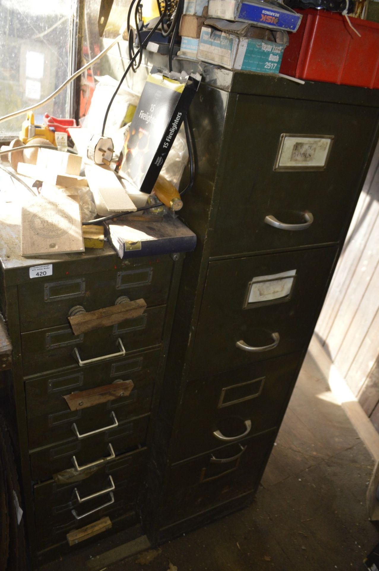 An eight drawer filing cabinet and a further example (2).