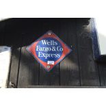 A wall plaque, inscribed 'Wells Fargo & Co. Express', width approx. 11".