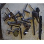 Miscellaneous items to include drill bits, T bars and a padlock.