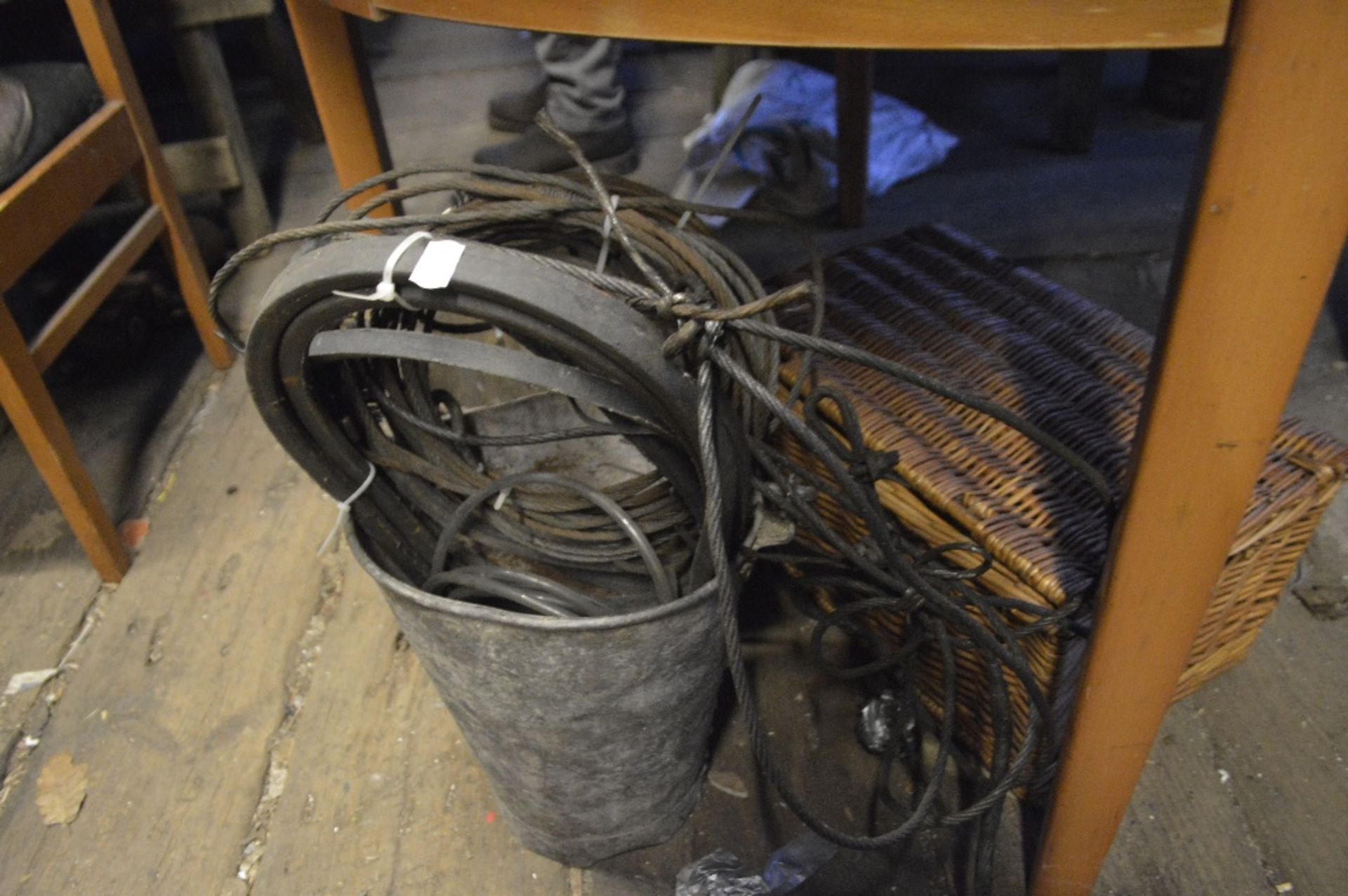 Two buckets, a V-belt, a flue cleaner and a wicker hamper (4).