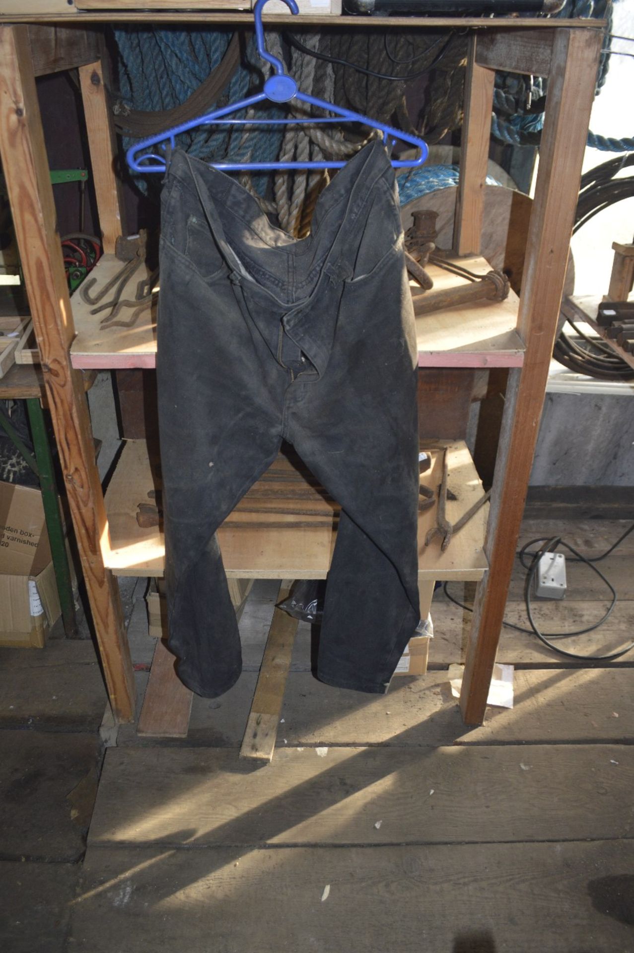 WITHDRAWN A pair of navy blue dungarees, a yellow mac, a suede jacket and a pair of jeans (4). - Image 4 of 4