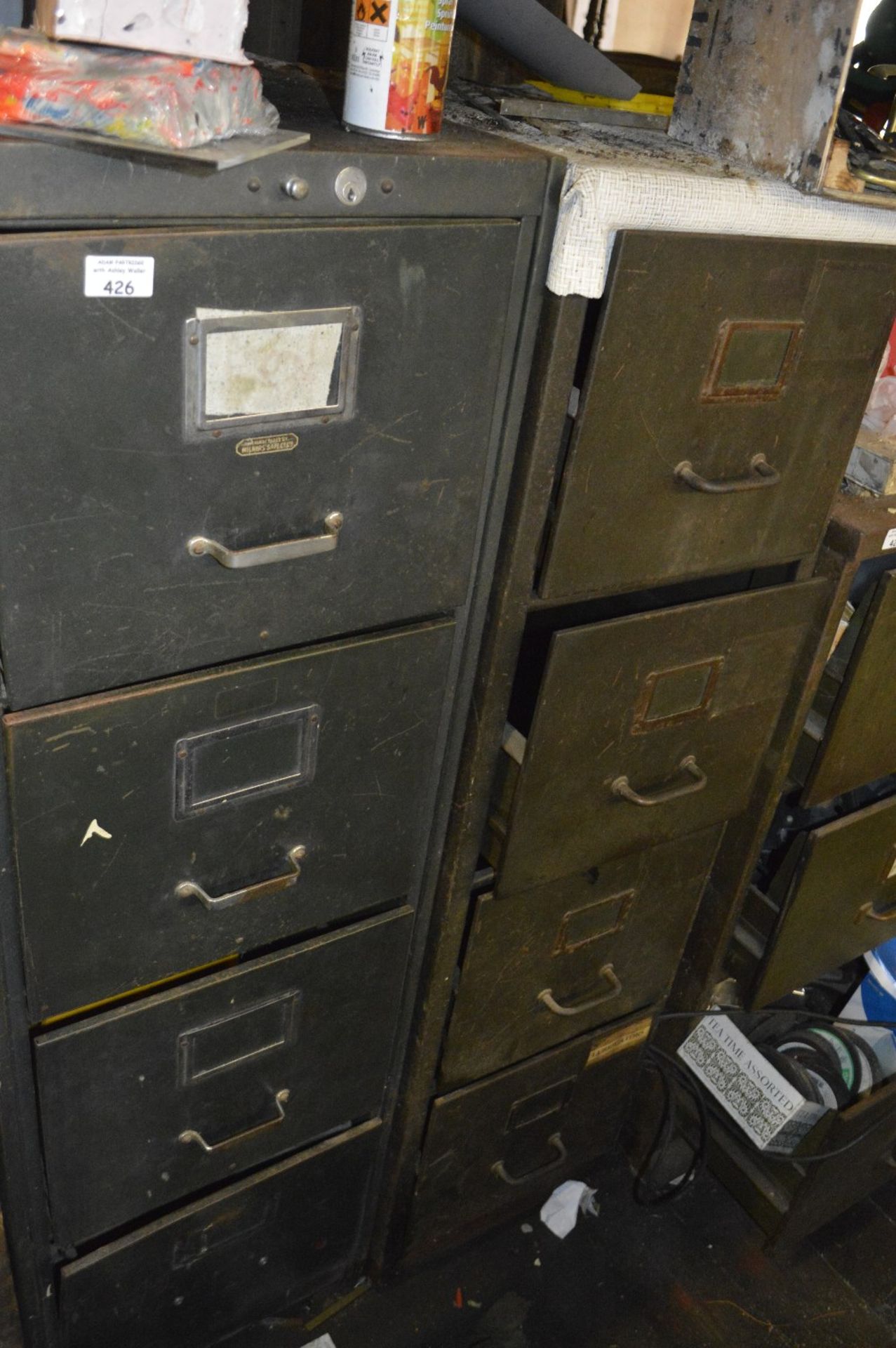 Two four drawer filing cabinets, one by Milner's Safe Co. Ltd. (2).