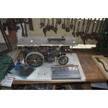 A miniature steam engine, 'two years in construction from cardboard and pieces of scrap,