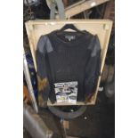 WITHDRAWN A Wynnster 'Commando' navy blue jumper with shoulder patches, size L,