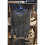 WITHDRAWN A grey wool V-neck sweater and two coats believed to have been owned and worn by Fred