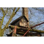 A wooden hut built by Dibnah to protect part of the shed from water damage.