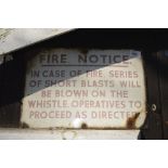A wall plaque, inscribed 'Fire notice.