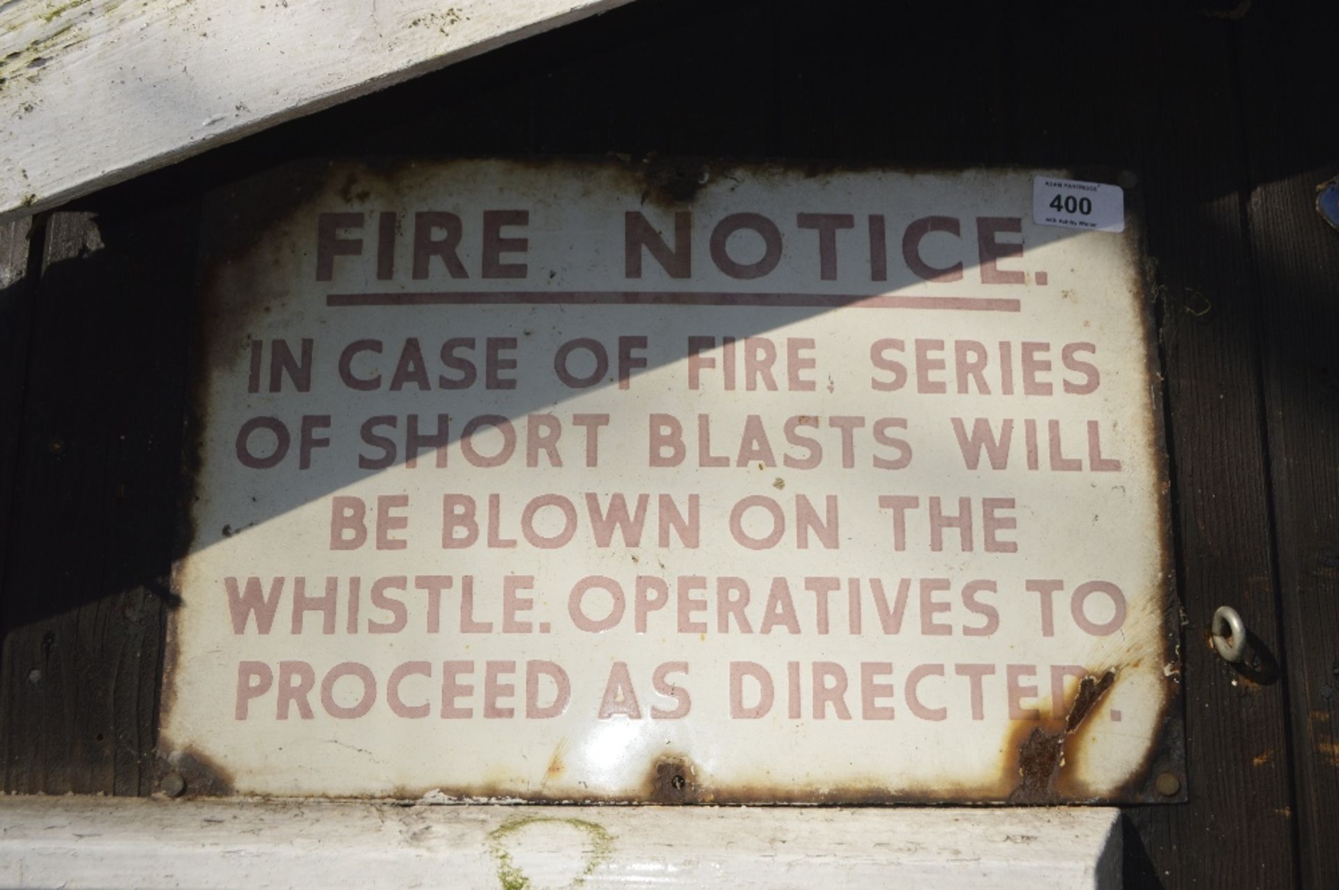 A wall plaque, inscribed 'Fire notice.