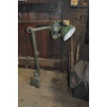 An angle poise lamp, inscribed 'Made in England', and a pair of welding goggles (2).