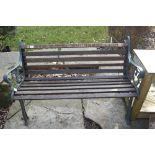 A cast iron ended garden bench, width approx. 50".