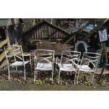 A wooden bench and four white chairs (5).