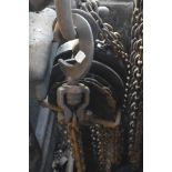 A block and tackle, and various chains.