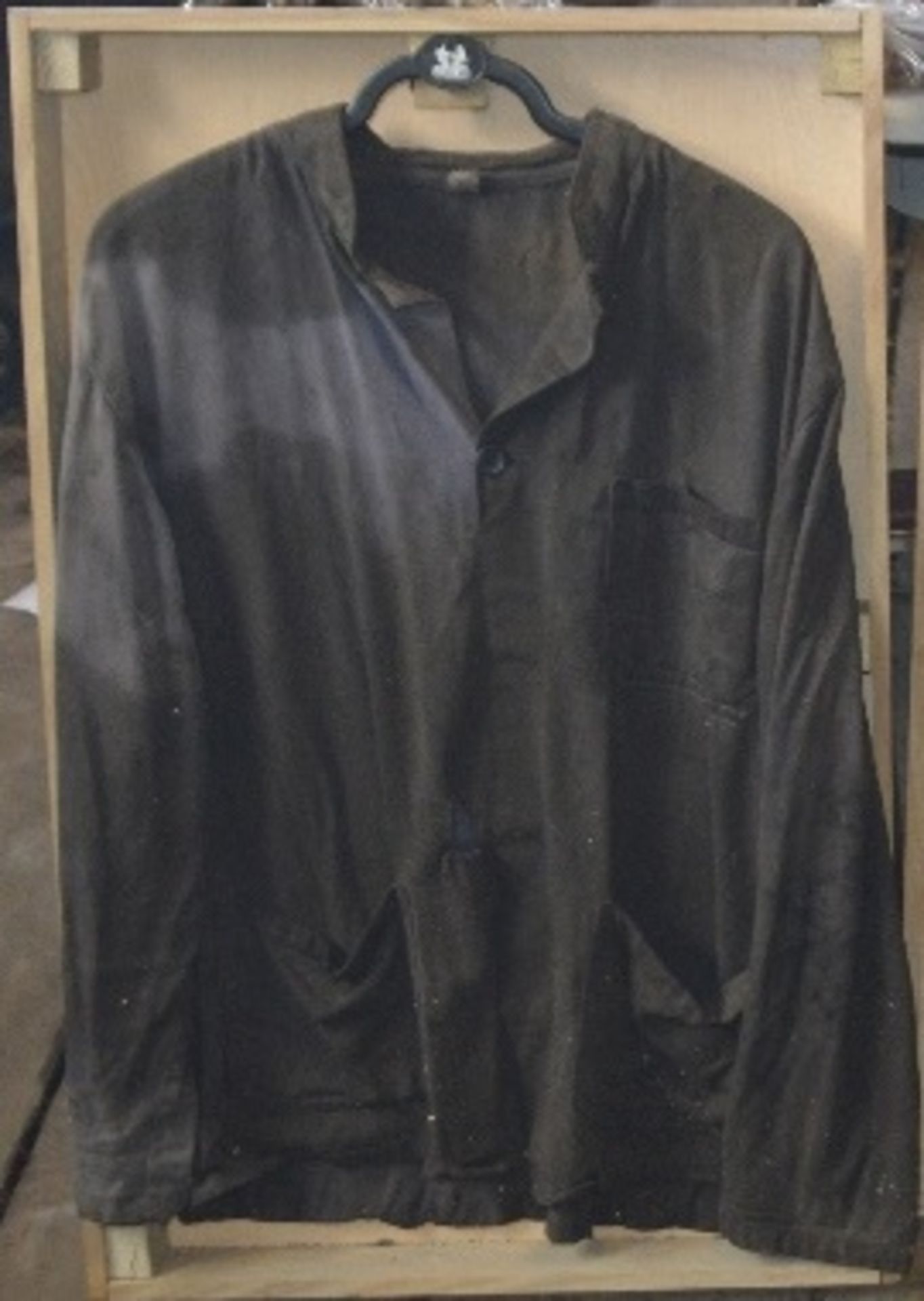 WITHDRAWN An over shirt believed to have been owned and worn by Fred Dibnah, in display case.