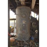 A cast iron steam boiler by Chris Holden Ltd. Blackburn, height approx. 7ft.