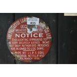 An enamel wall plaque, inscribed 'The Protector Lam... Co Ltd (ec...) Makers...er's notice.